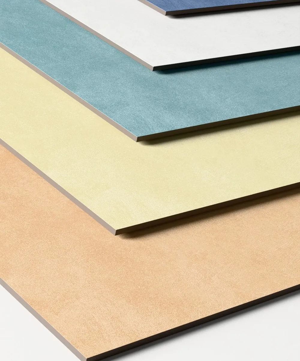 Stack of plain matt tiles in blue, teal, sand and terracotta